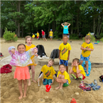 Camp Venture Participants playing in the sand at the beach