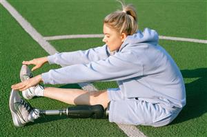 Woman stretching on the field